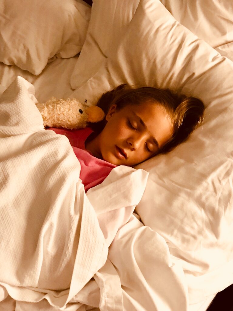 A girl sleeping peacefully image
