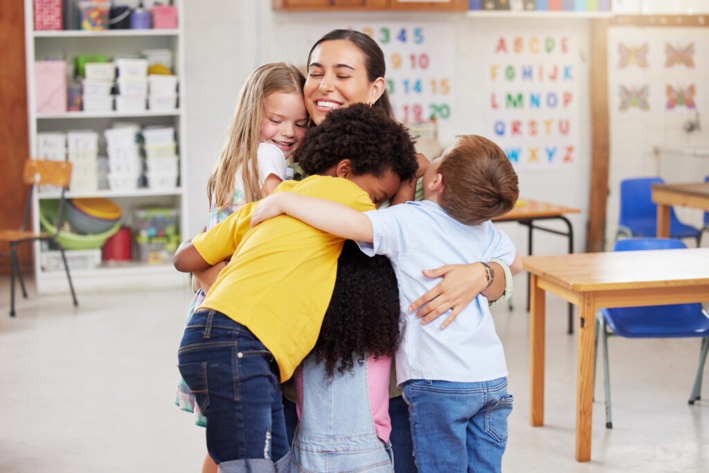 shot-of-a-woman-hugging-her-learners image