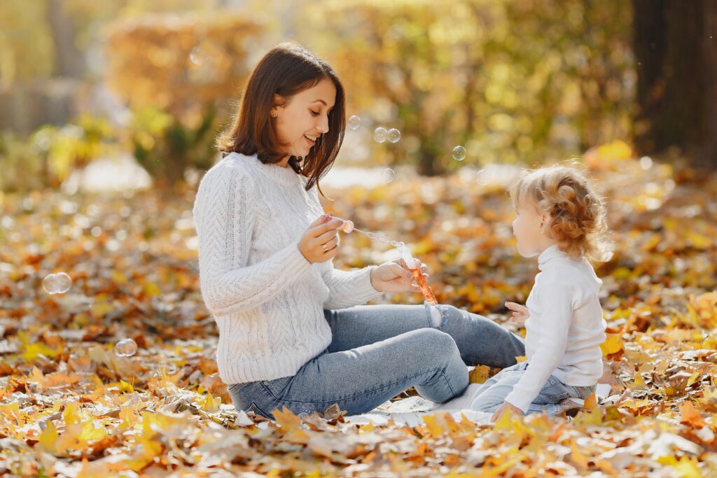 Mom and little daughter in the park image