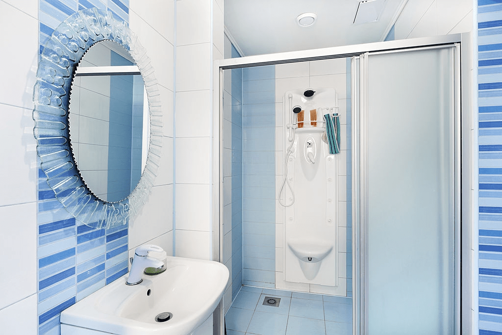 IS IT NECESSARY TO KEEP GLASS SHOWER DOORS CLEAN REGULARLY
