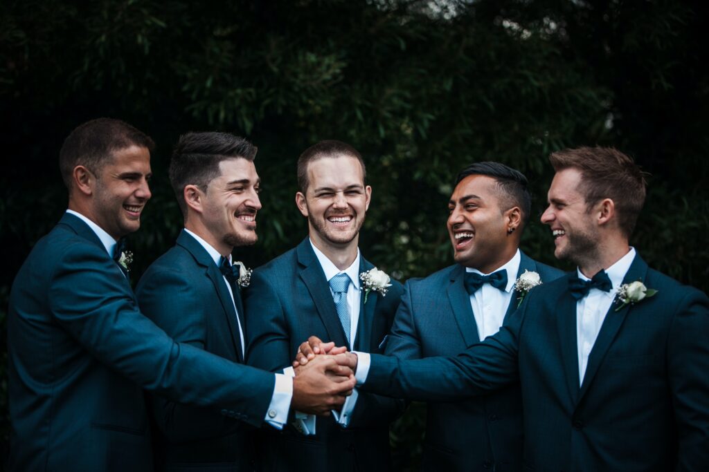 groom with the grooms men image