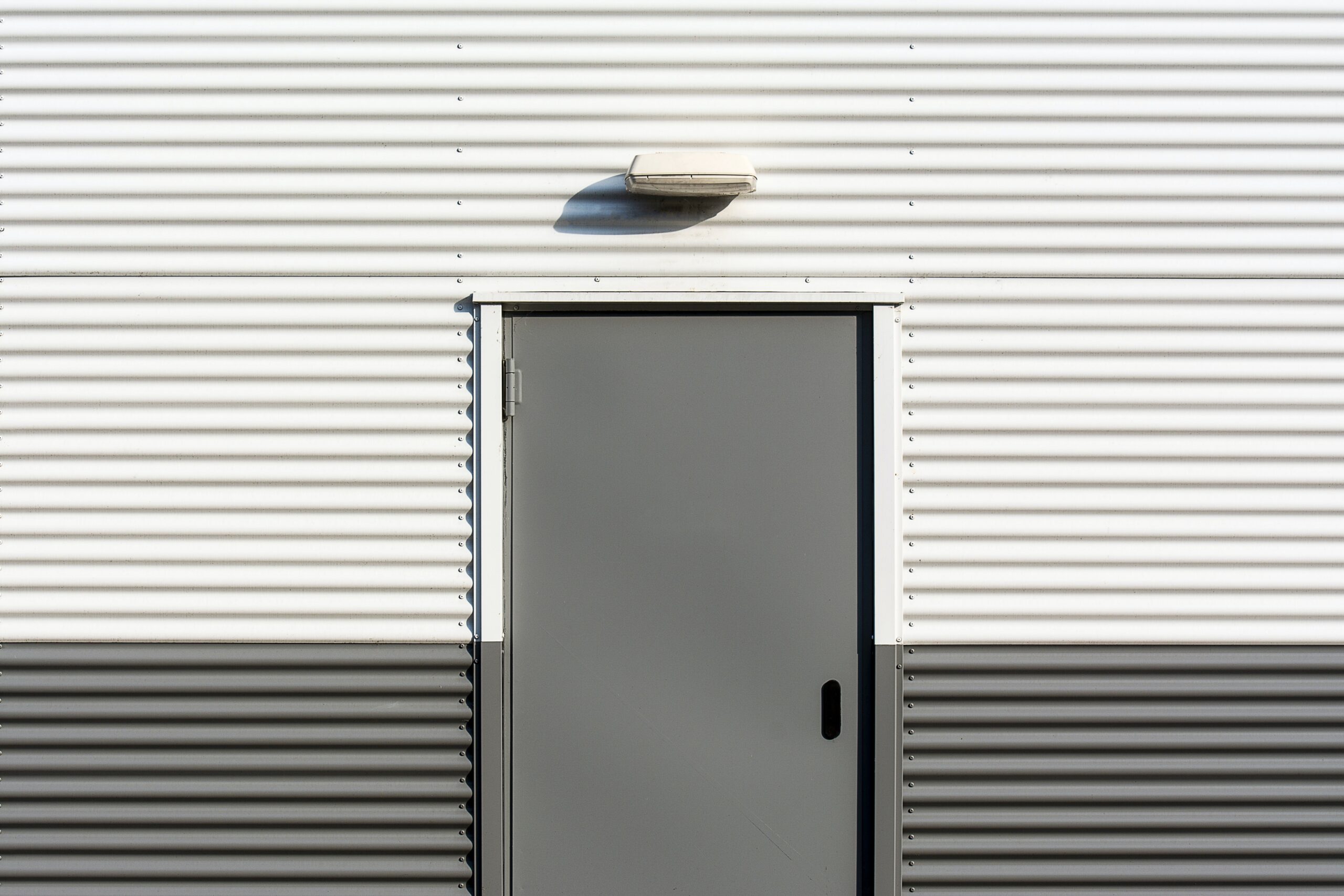 A grey aluminum door image