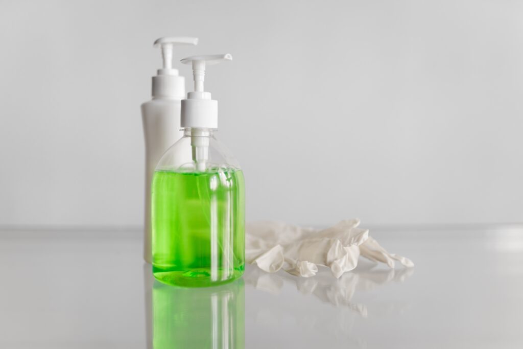 disinfectant soap stand on the table on a white background image
