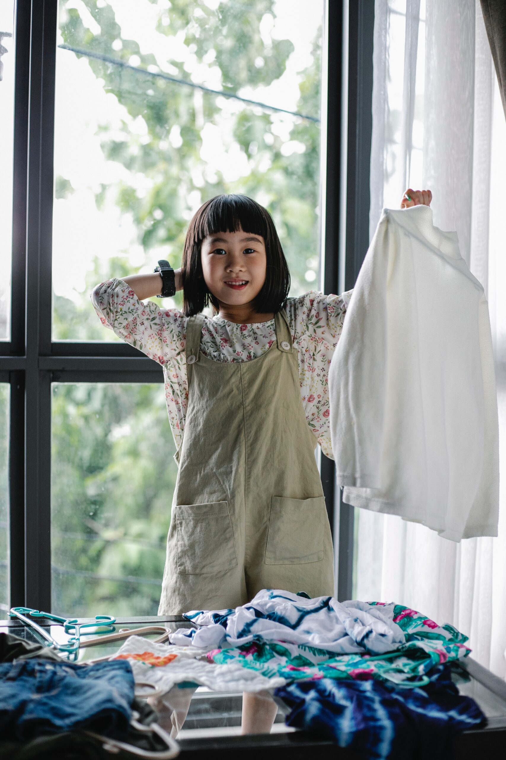 girl sorting clothes