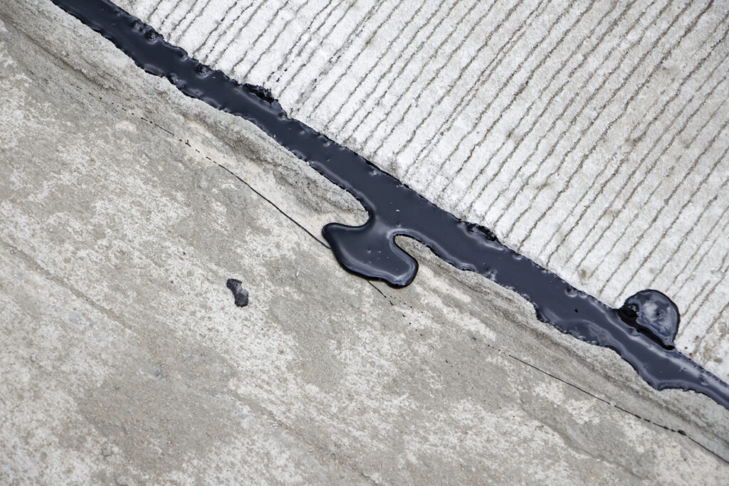 Asphalt crack filler, driveway asphalt crack repair, cold liquid, joint sealant