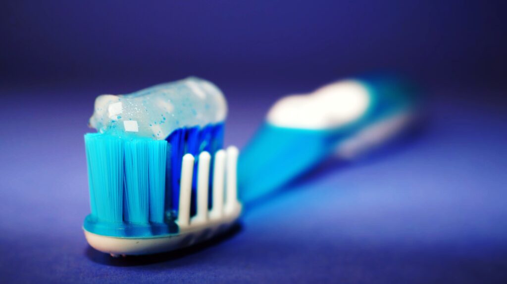 toothbrush with toothpaste image