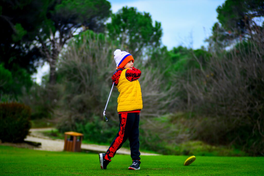 A Boy Playing Golf