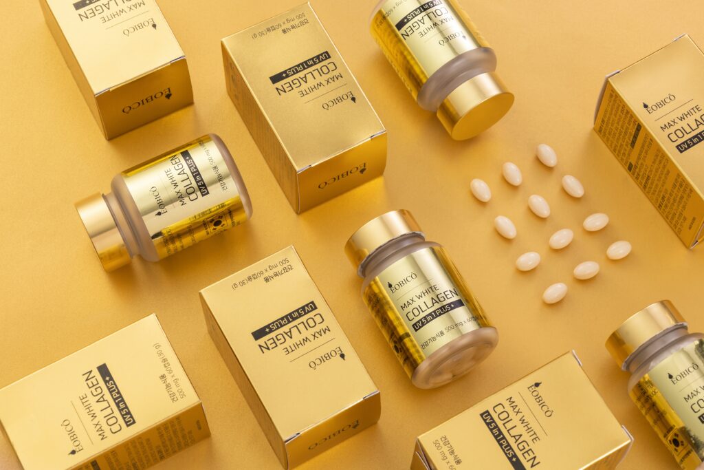 collagen in gold bottles and boxes
