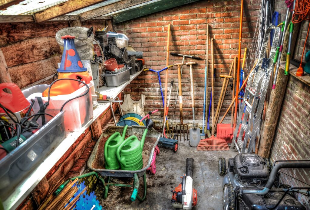 an image of a shed with gardening equipment