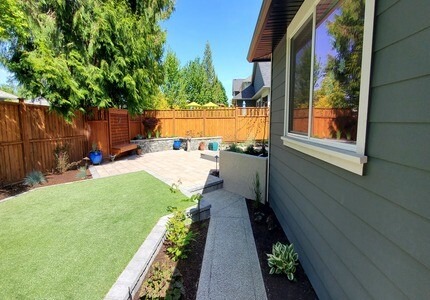 Artificial turf, patio, deck and retaining wall in Duncan BC image