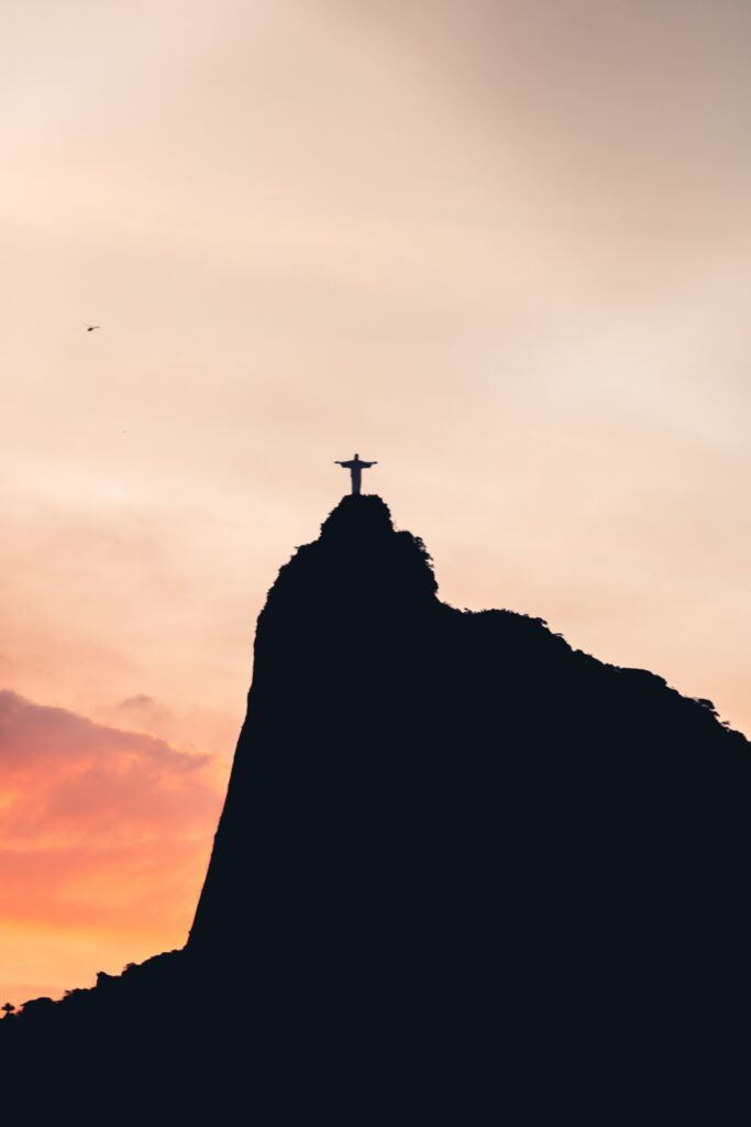 A silhouette of the Christ the Redeemer statue in Brazil