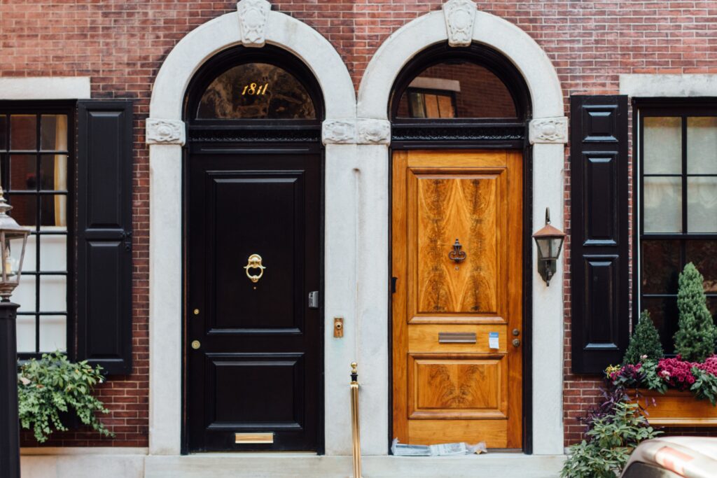 black and wooden door side-by-side image