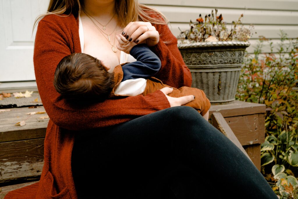 an image of a woman breastfeeding her baby
