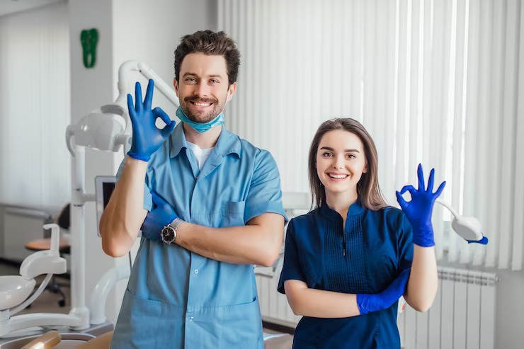 Dentists making positive cheerful gestures image
