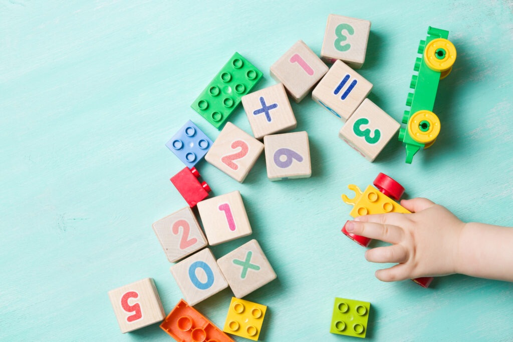 child-playing-with-wooden-cubes image