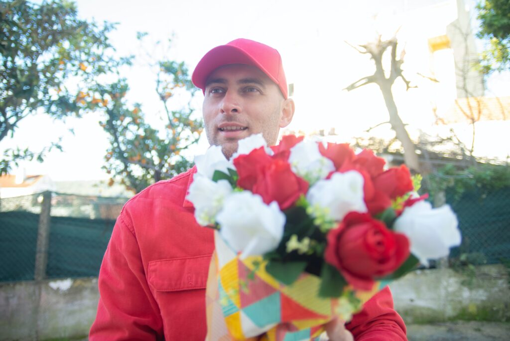 man-holding-a-bouquet-of-roses image