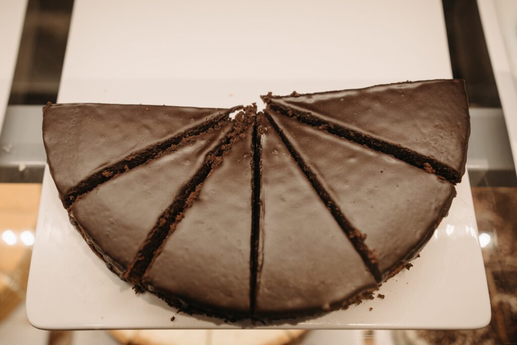 Slices of chocolate cake on board image