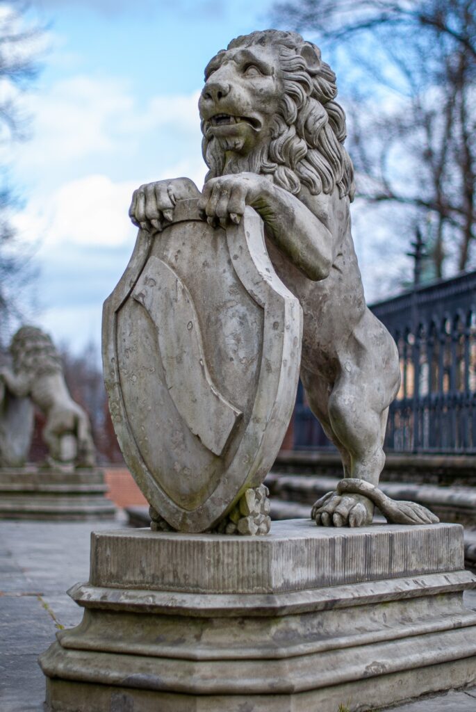 A concrete lion statue image