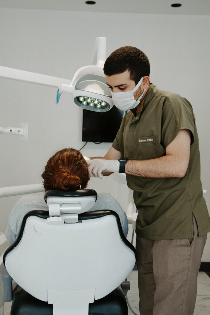 an orthodontist checking his patient image