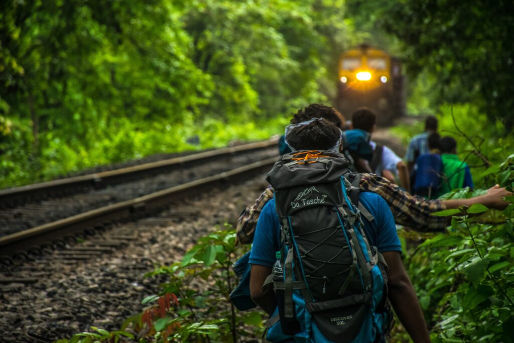  A group of backpackers in a trail image