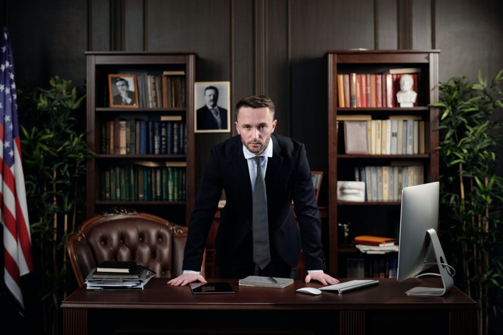 businessman-in-his-office-looking-at-the-camera image