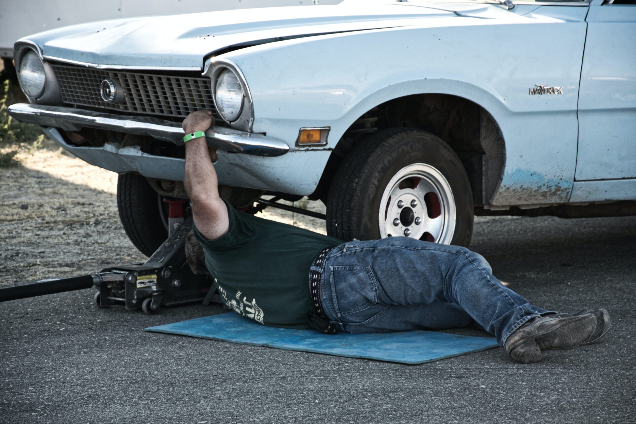 A man fixing his car