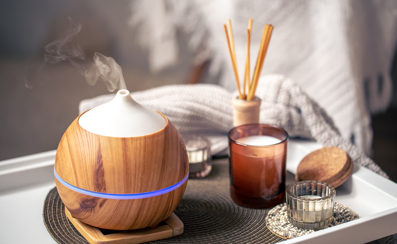 An aroma diffuser and candles