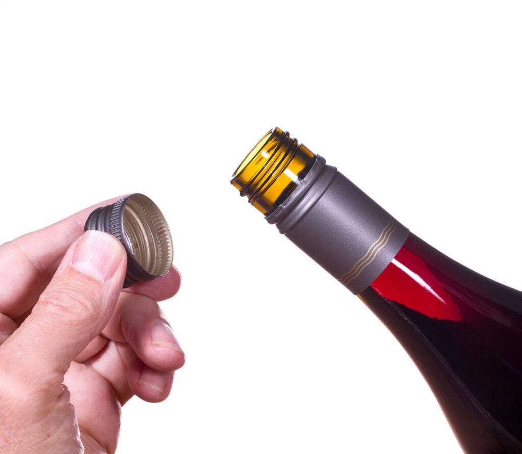 A red wine bottle opened screw top