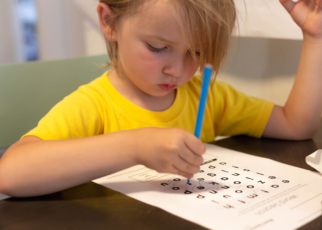 A child playing word search