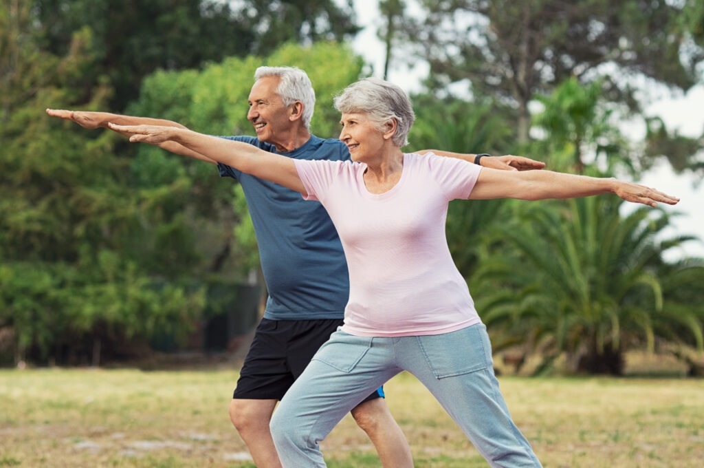 man and woman doing stretching exercise image