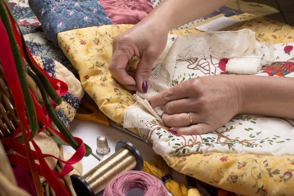 An Image Showing Quilting equipment and fabrics