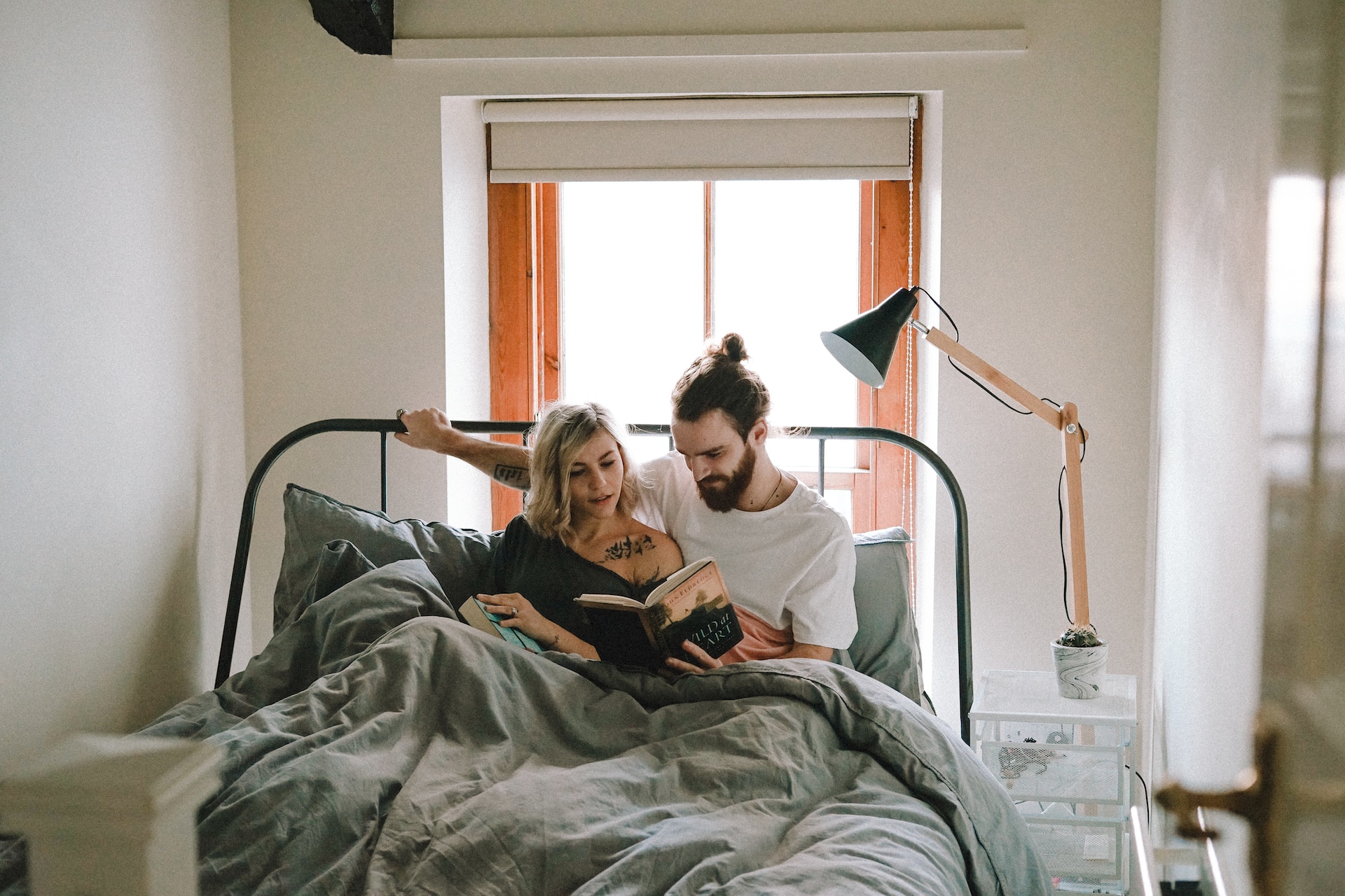 Couple, Love Images, Home, Lover, Boyf, Partner, Relationship, United Kingdom, Sweetheart, Boyfriend and Girlfriend, Bed, Reading in Bed, Reading, Bedroom, Man, Sheets, Décor, Furniture