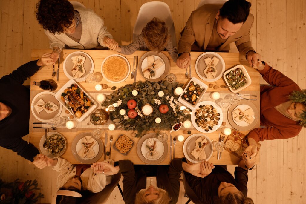 Family Praying Before Christmas Dinner image