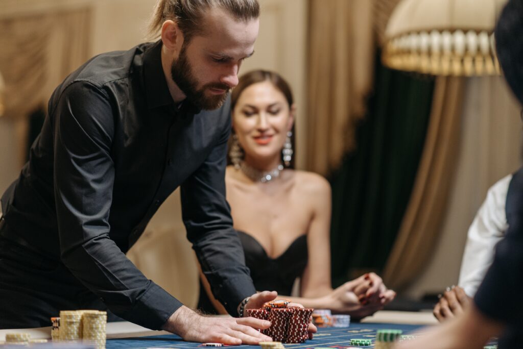 man betting casino chips image