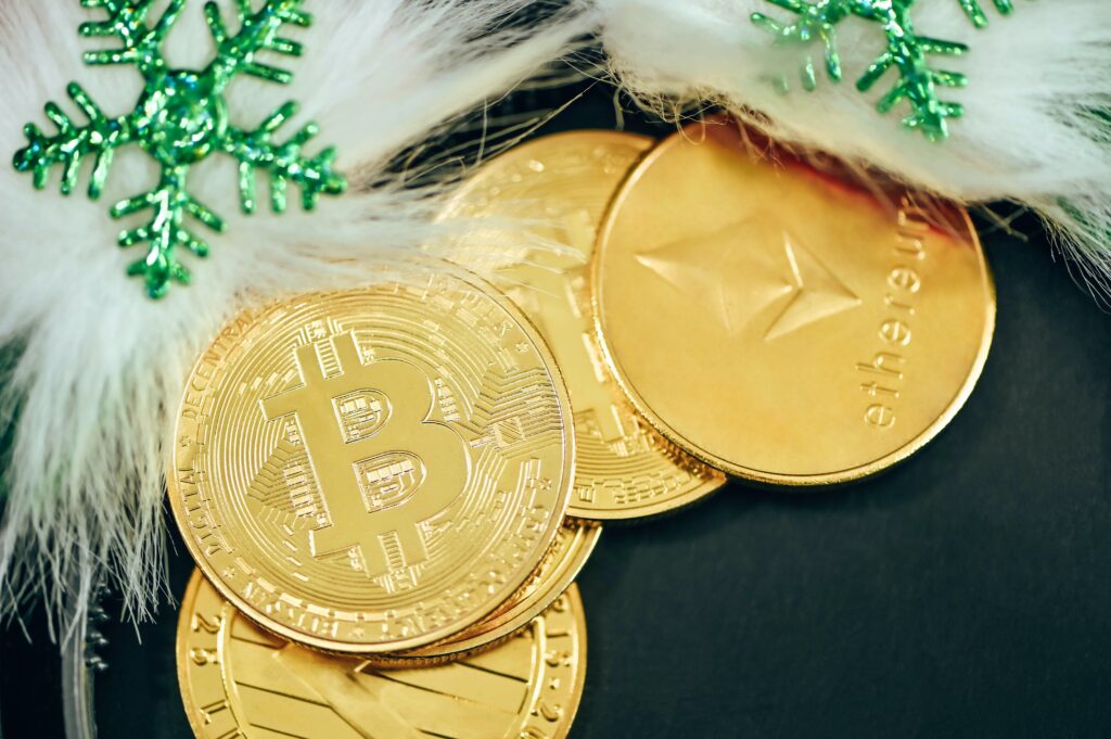 pile of gold bitcoins sitting on top of a table image