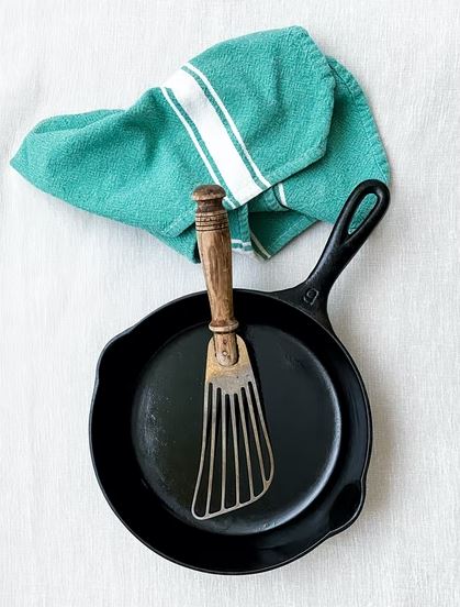 A cast iron on a frying pan