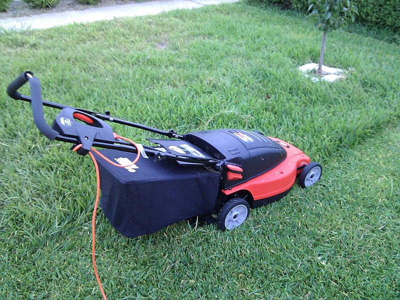 Image of Electric lawn mower with a cord