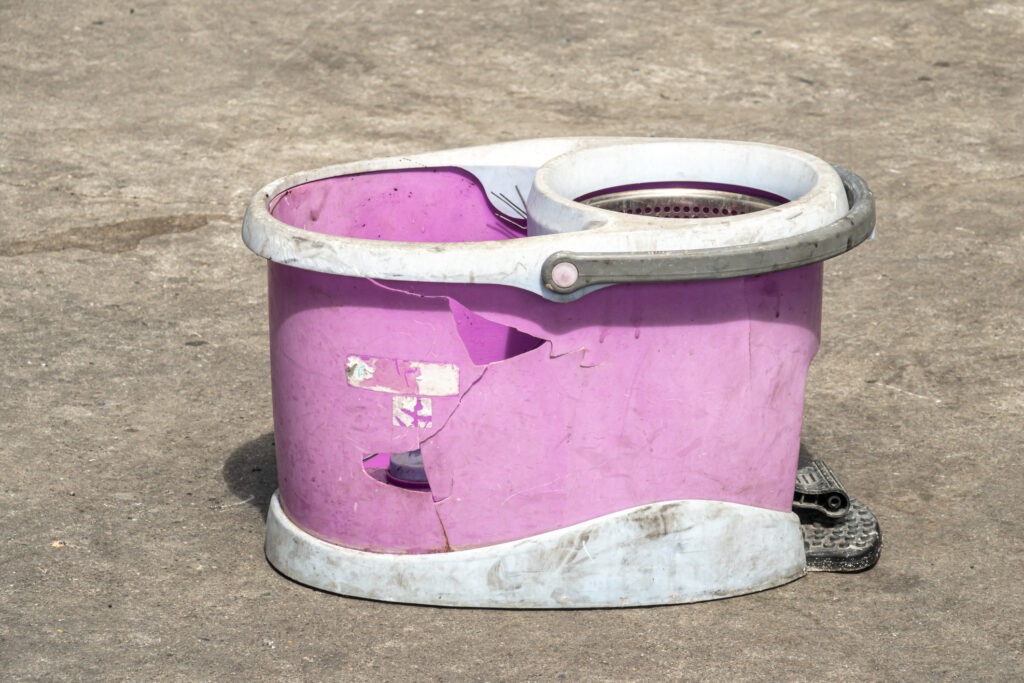broken-old-plastic-mop-bucket image