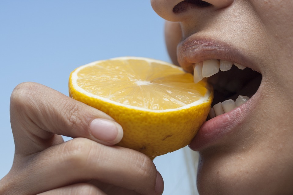 biting a lemon image