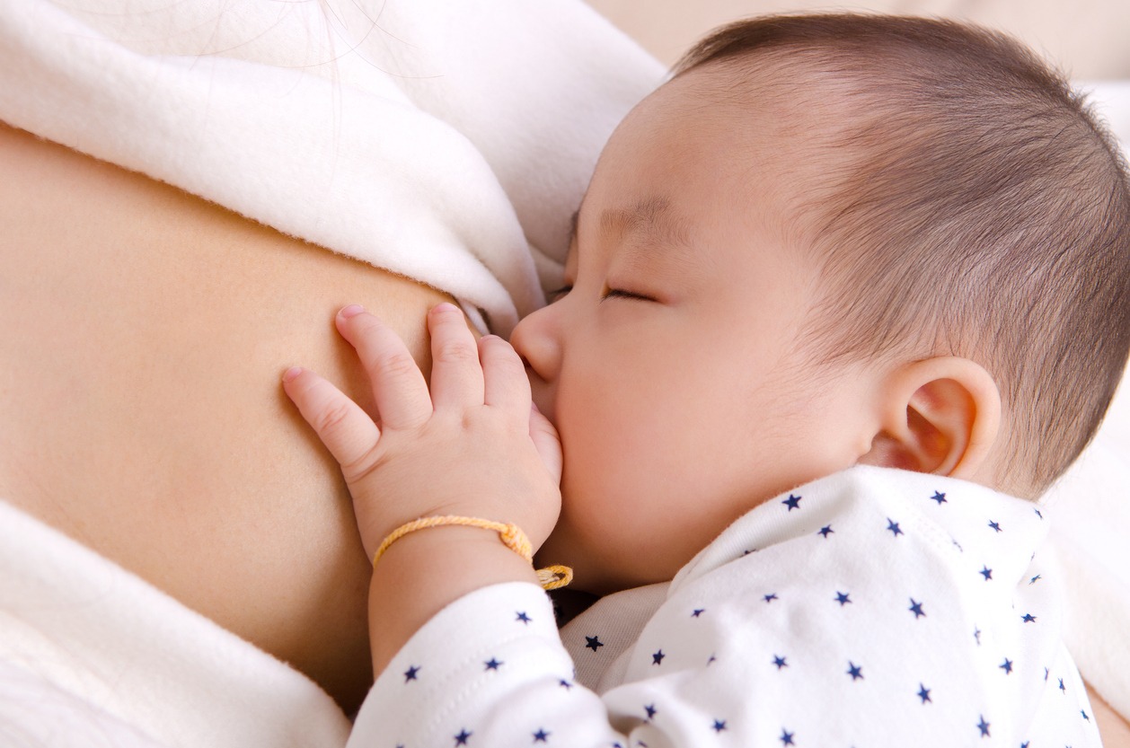 a baby breastfeeding