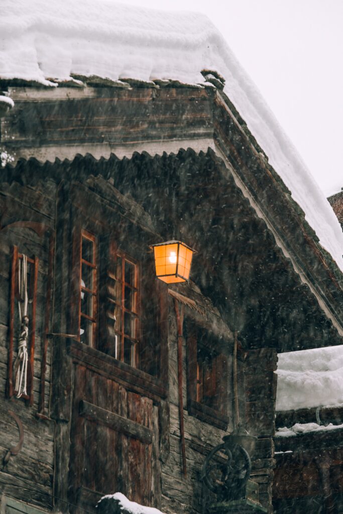 cottage covered in snow image