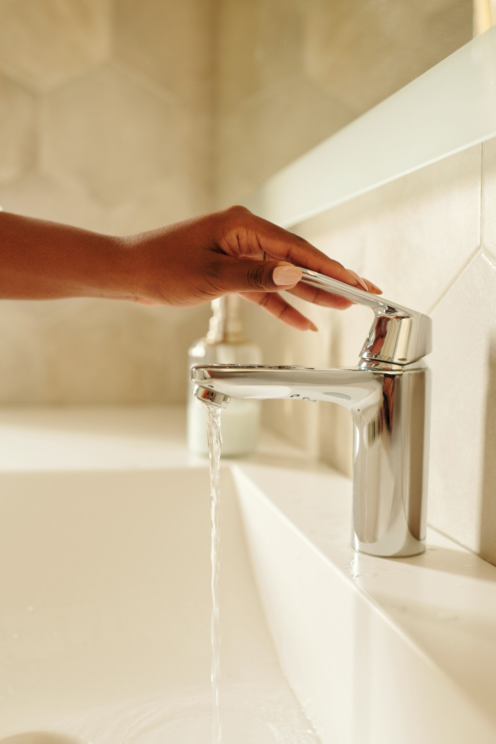 person-holding-a-faucet image