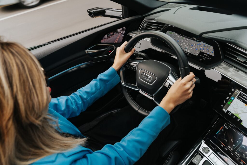 woman-driving-a-new-audi-car image