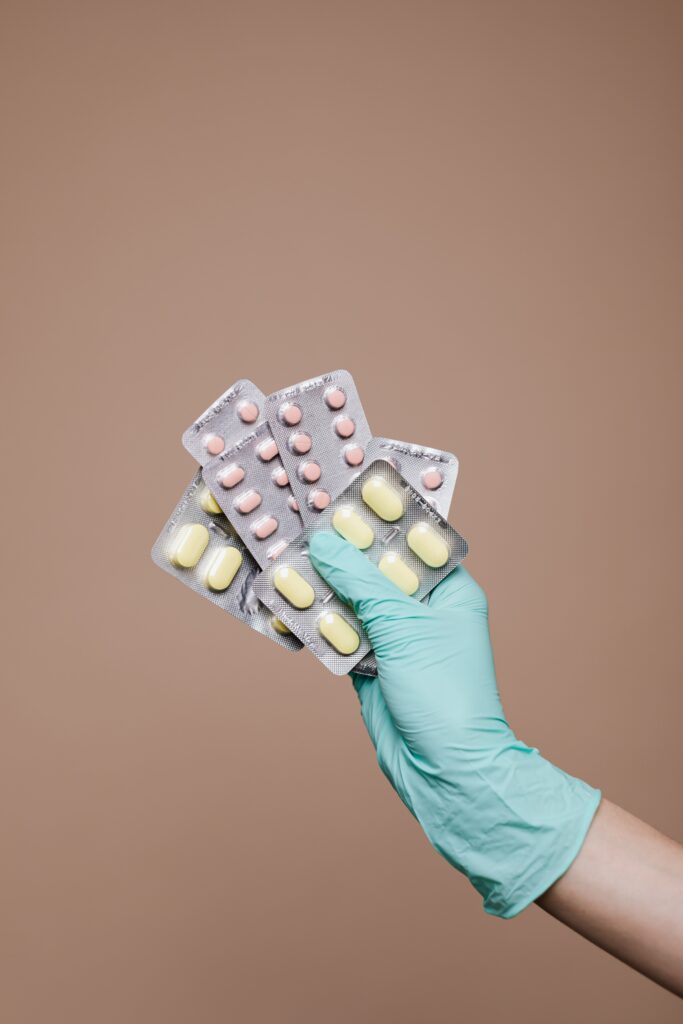 Person holding medicines image