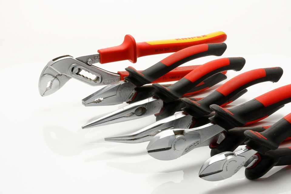 a collection of various crafting pliers