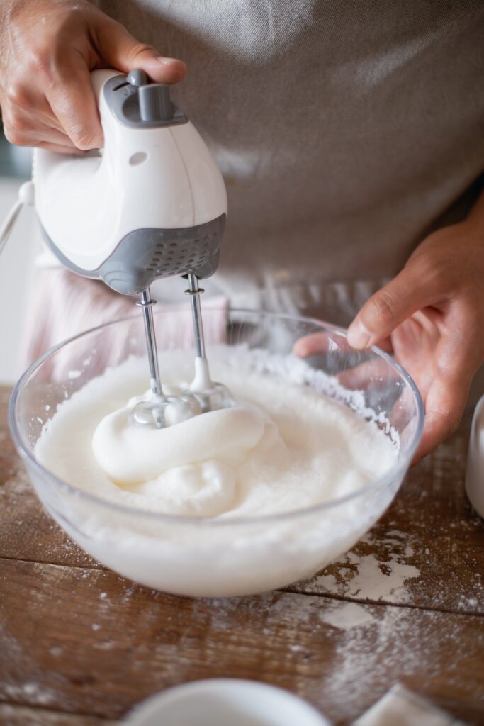 person mixing icing image