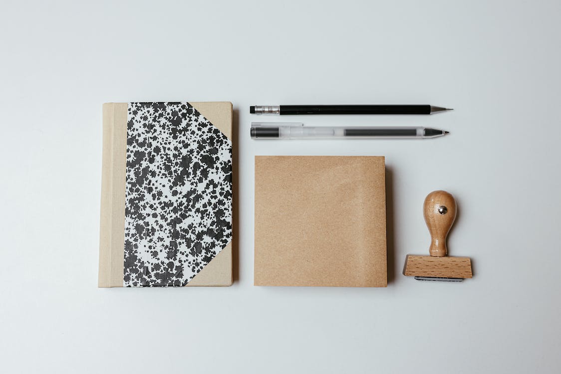 Stationery supplies on white surface