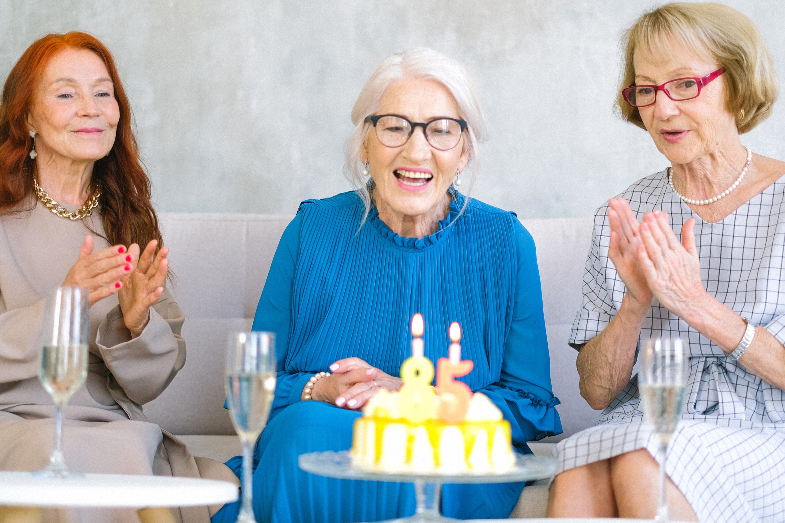 An elderly woman celebrating her birthday