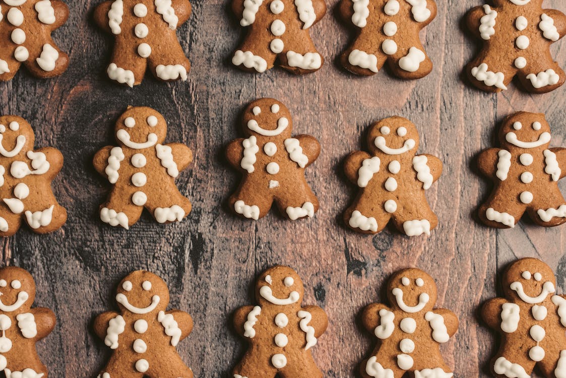 a close-up of gingerbread cookies on a wooden table